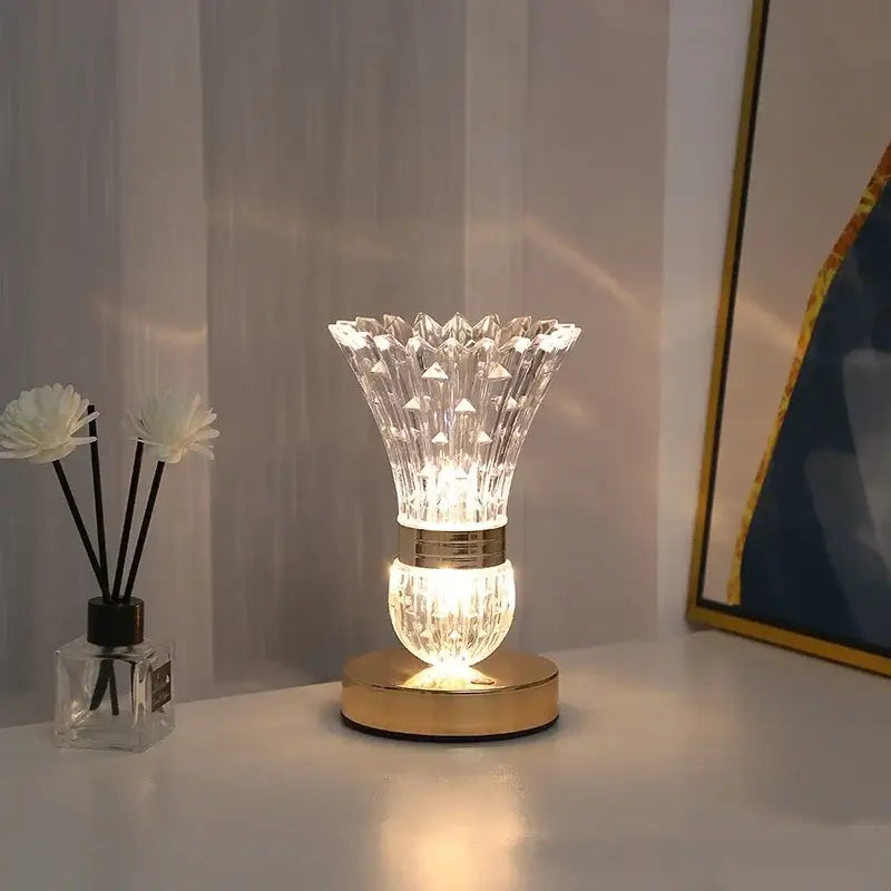 Elegant gold crystal led vase table lamp with intricate faceted design emitting warm light for bedroom decorbites crystal led