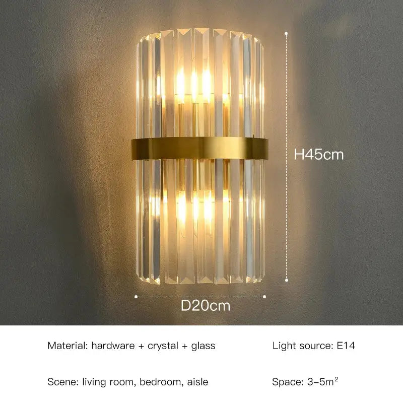 Elegant gold crystal led wall lamps featuring vertical crystal rods and a polished brass band illuminated by an e14 bulb