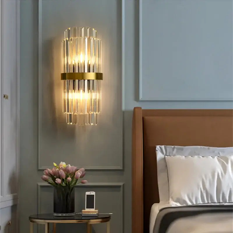 Elegant gold crystal led wall lamps featuring vertical crystal rods in a sleek frame for bedroom decorbites wall lamps