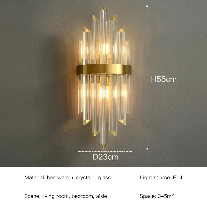 Elegant gold crystal led wall lamp with clear glass prisms cascading in chandelier style for bedroom decorbites decorbites crystal led wall lamps