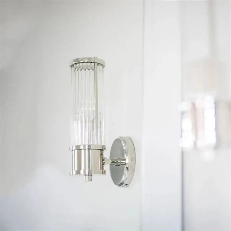 Elegant gold crystal led wall lights with polished chrome finish and vertical glass prisms for modern decorbites crystal led wall lighting