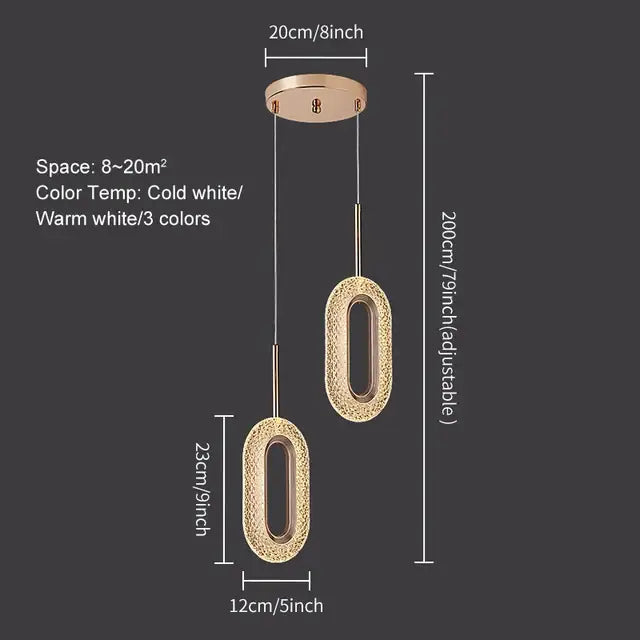 Elegant gold crystal oval pendant light chandelier with textured sparkling surface and adjustable hanging lengths for living room