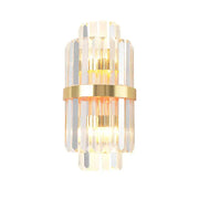 Elegant gold wall sconce light with stacked crystal prisms and central brass band for living room lighting