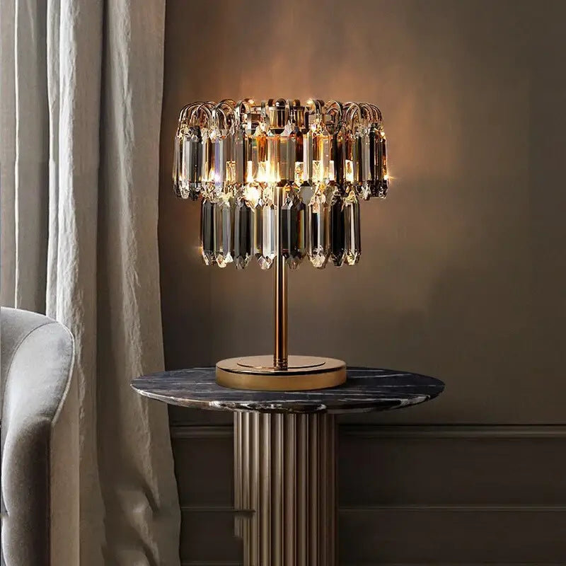 Elegant gold crystal table decor lamp with cascading prisms and modern design for bedroom desk lighting