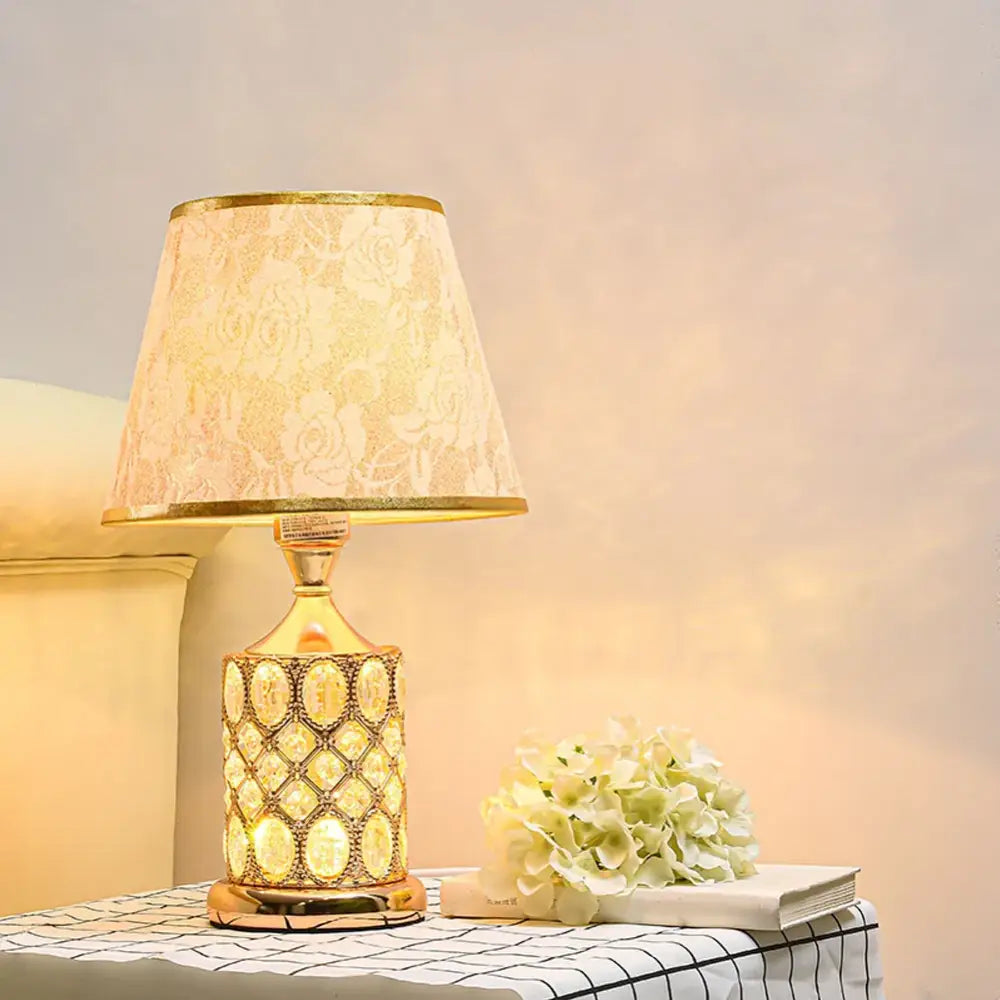 Elegant gold crystal table lamp with lace-patterned cream shade and oval crystal inlays ideal for bedroom decorbites crystal table
