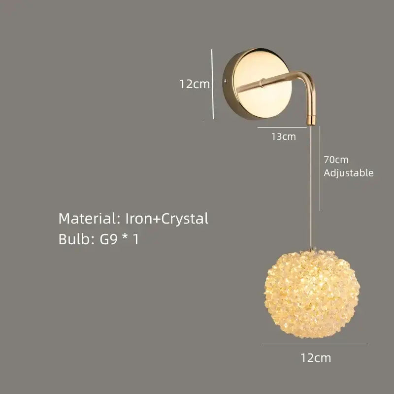 Elegant gold crystal wall lamp with spherical pendant light and adjustable iron mounting bracket for bedroom decorbites crystal wall lighting