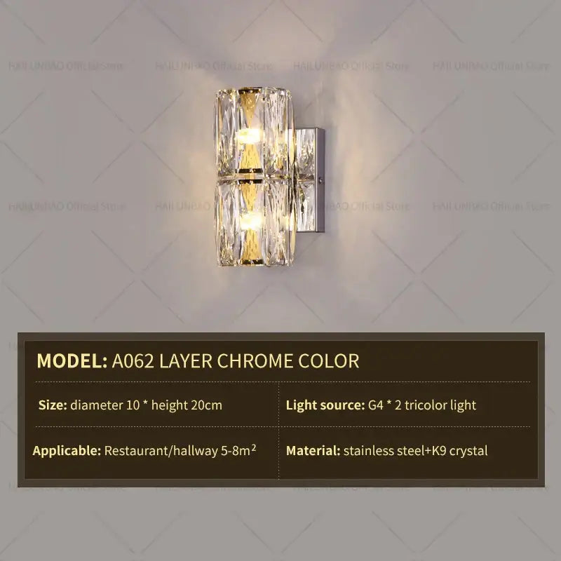Elegant gold crystal wall lamp featuring stacked faceted k9 crystal panels in a chrome stainless steel frame decorbites crystal wall lamp