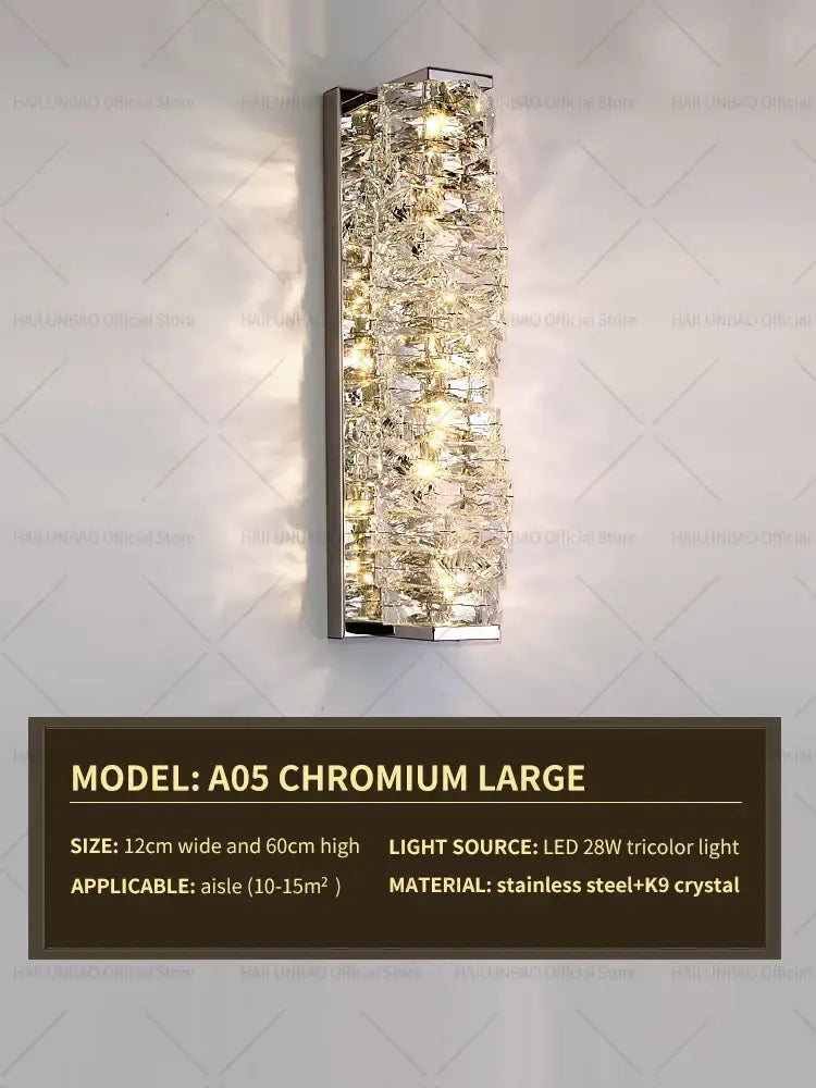 Elegant gold crystal wall lamp with rectangular chrome frame and cascading k9 crystals emitting warm led tricolor light