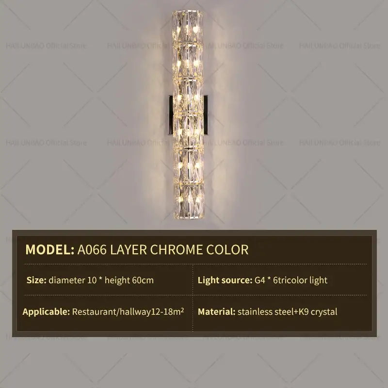 A sleek chrome crystal wall lamp with stacked k9 crystals emitting warm light for elegant living room decorbites wall lamp