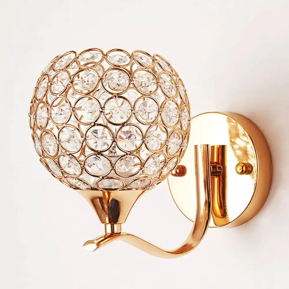 Elegant gold crystal wall sconce with a spherical globe design perfect for bedroom decorbites crystal wall lighting