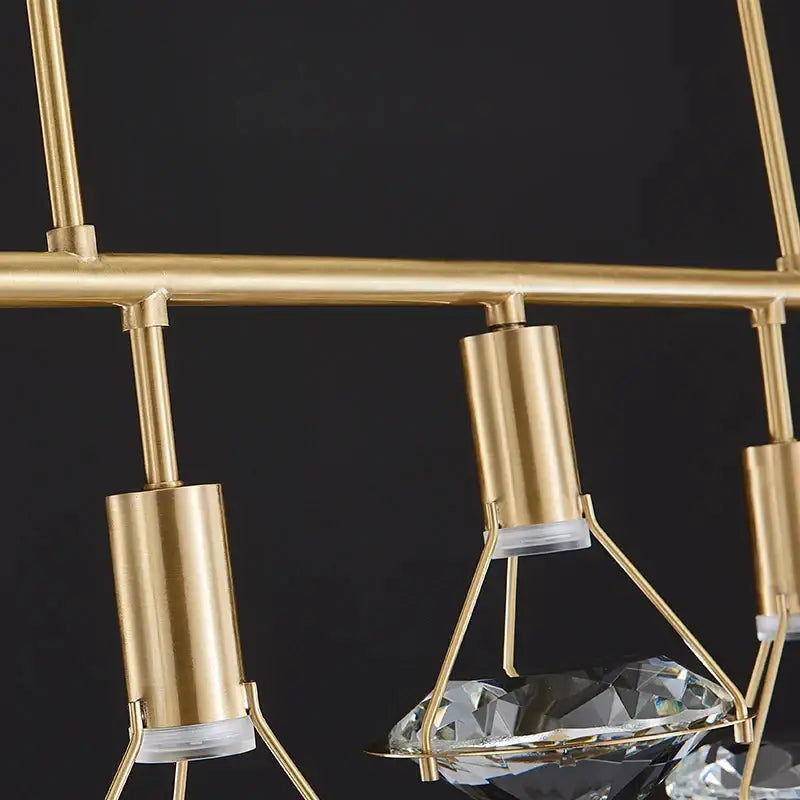 Elegant gold-toned metal pendant light with diamond crystal pendant accents for dining room illumination