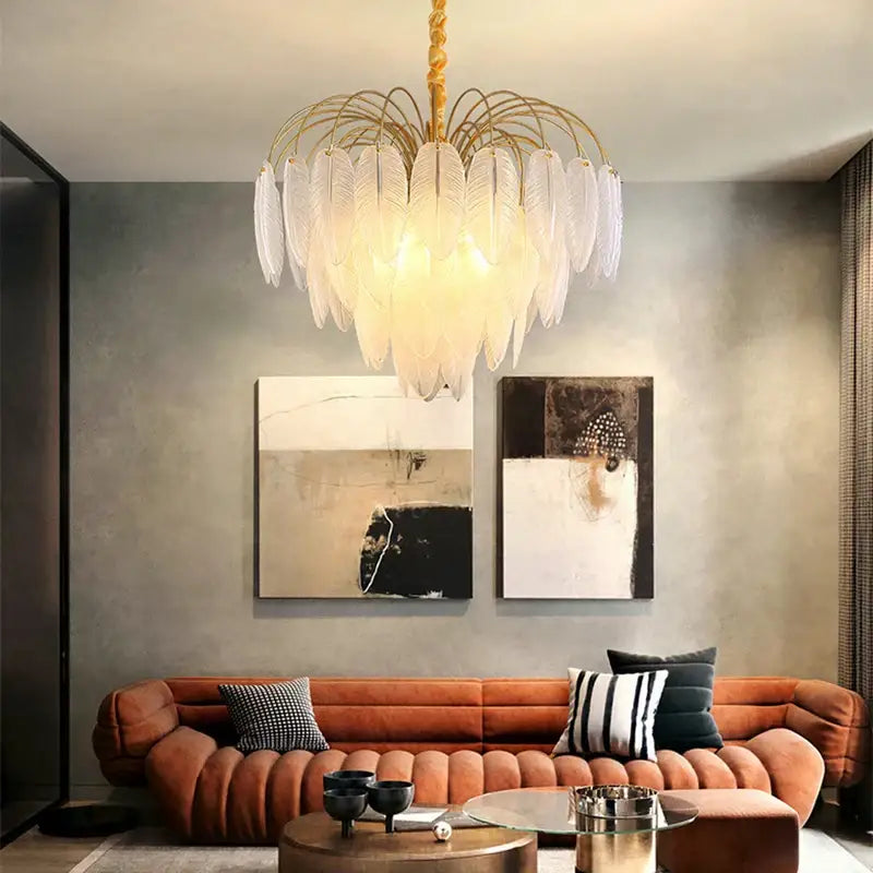 Elegant gold glass feather led hanging chandelier with white feathers and gold-toned frame for foyer lighting