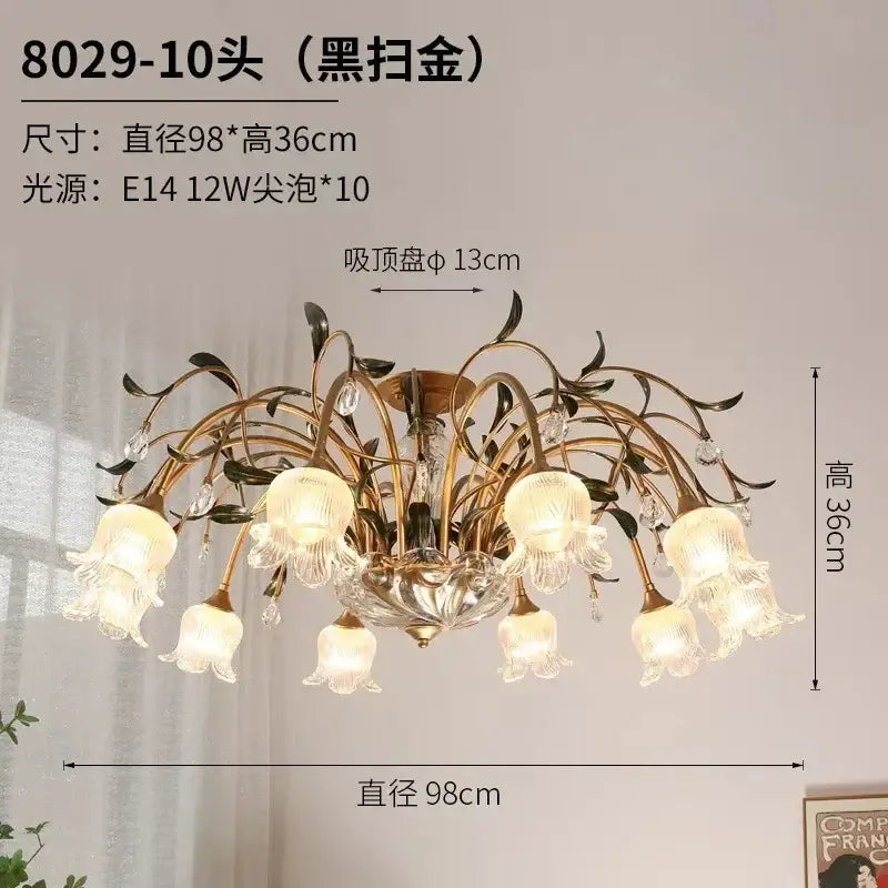 Elegant gold glass flower chandelier with ten frosted glass shades and crystal accents for lobby lighting