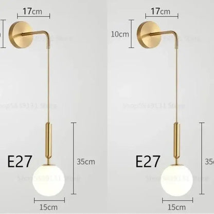 Elegant gold glass wall lamp with minimalist curved arm and frosted globe shade for living room decorbites elegant glass wall lamp