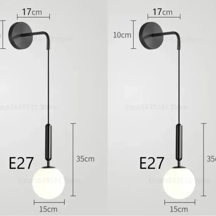 Black modern wall lamp with sleek curved arm and frosted glass globe shade decorbites elegant glass wall decor