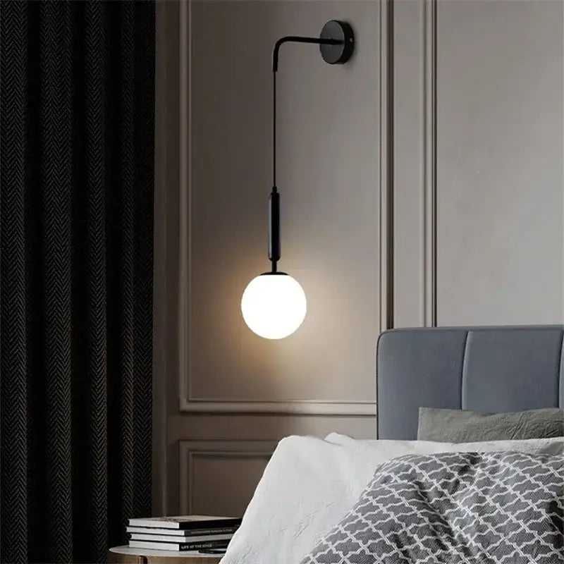 Black metal wall lamp with frosted globe shade from decorbites elegant glass collection for living room decor