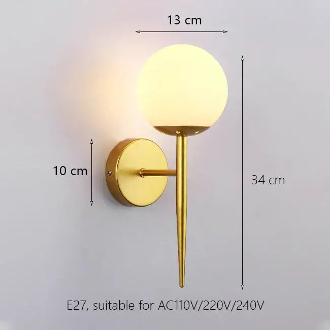 Elegant gold iron wall lamp with frosted glass shade and slender stem for bedroom decorbites iron wall lamp