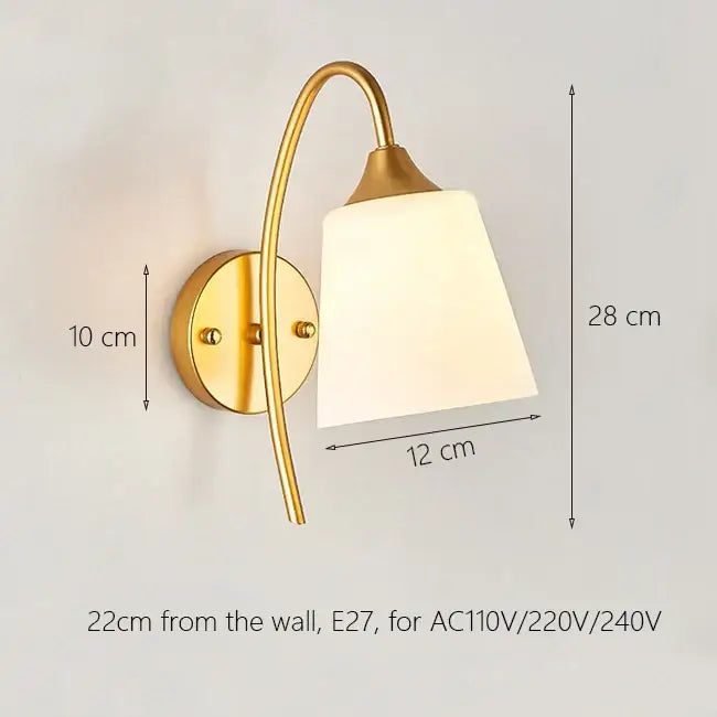 Elegant gold iron wall lamp with curved arm and frosted glass shade ideal for bedroom decorbites iron wall lamp