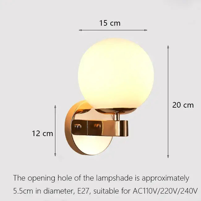 Elegant gold iron wall lamp with frosted glass shade featuring a gold-toned iron wall lamp for bedroom decorbites