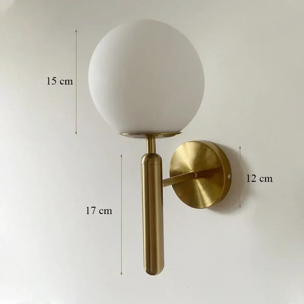 Elegant gold iron wall lamp with brass finish and frosted glass shade ideal for bedroom decorbites iron wall lamp