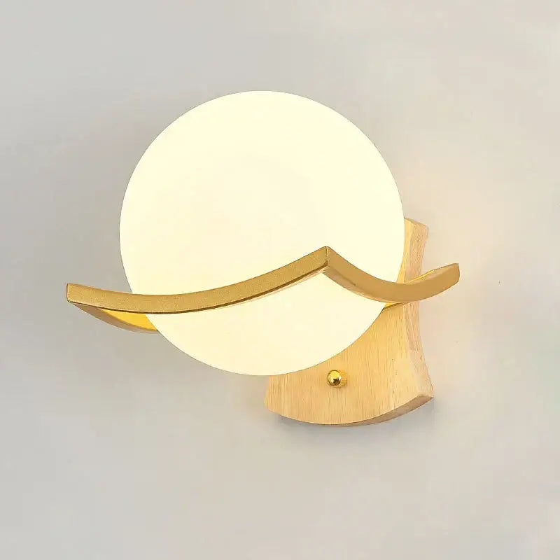 Elegant gold iron wall lamp with frosted glass shade and wood base featuring flowing wave metal decorbites iron wall lamp