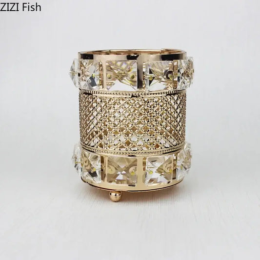 Elegant gold lattice hollow glass jar candle holder with intricate design and clear crystal accents for makeup brushes
