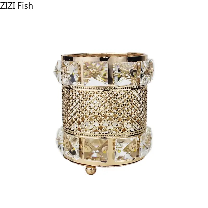 Elegant gold lattice hollow glass jar makeup brush holder with intricate cylindrical design and clear crystal accents