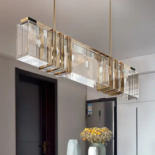 Elegant gold lustre pendant light with gold-toned rectangular frame and vertical crystal rods for dining room decorbites elegant gold