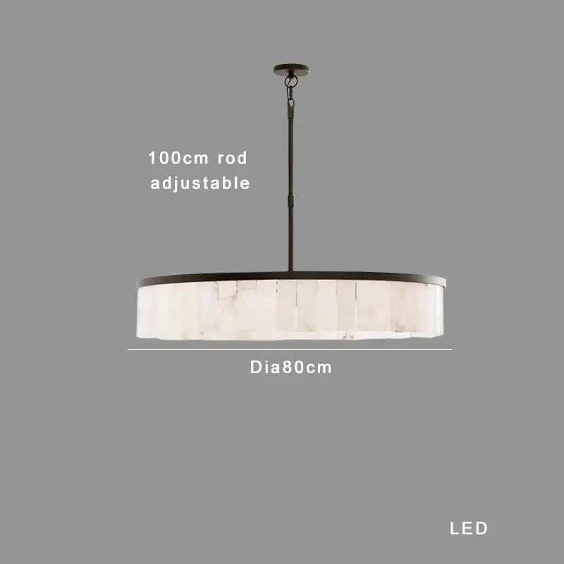 A modern circular pendant light with dark metal frame and white marble panels for elegant gold marble ceiling decorbites