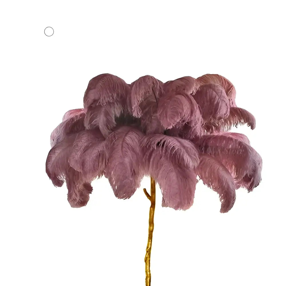 A decorbites elegant ostrich feather floor lamp with plush dusty rose feathers and a slender gold-toned stem