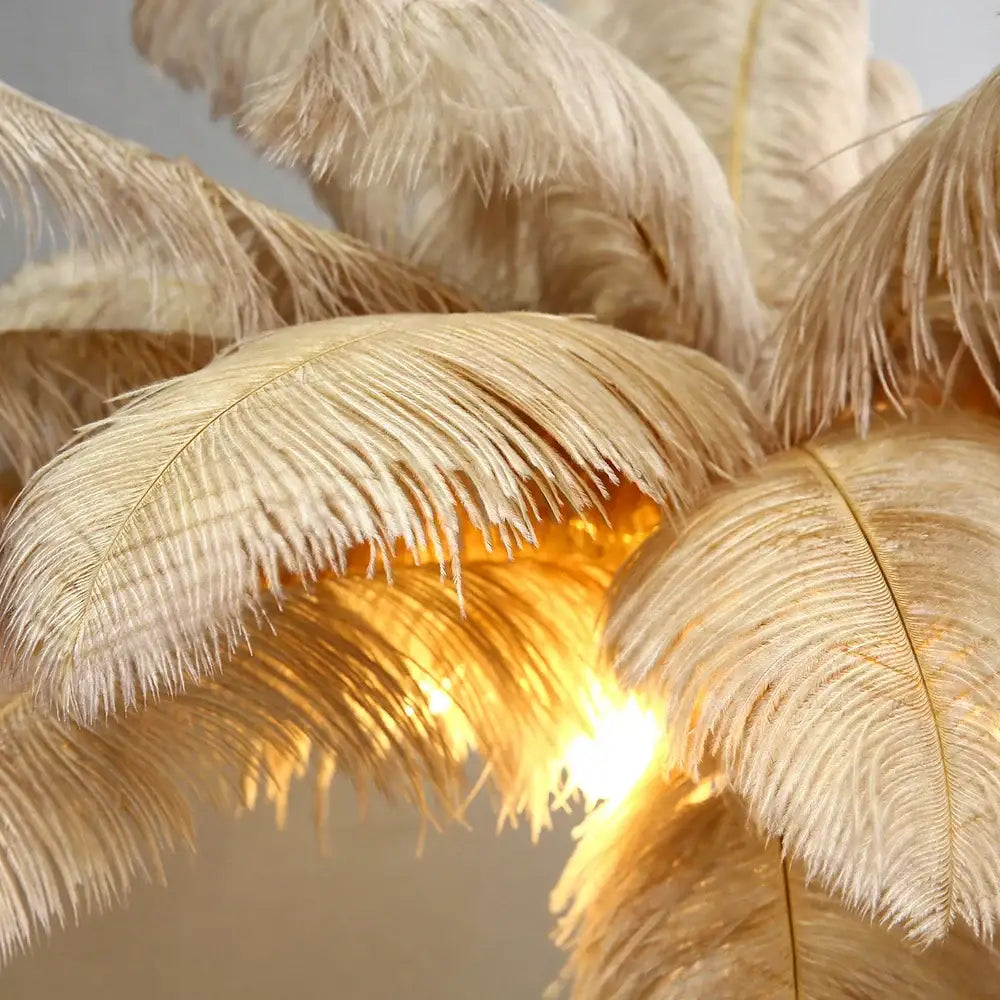A decorbites elegant ostrich feather floor lamp featuring warm beige natural feathers for stylish bedroom lighting