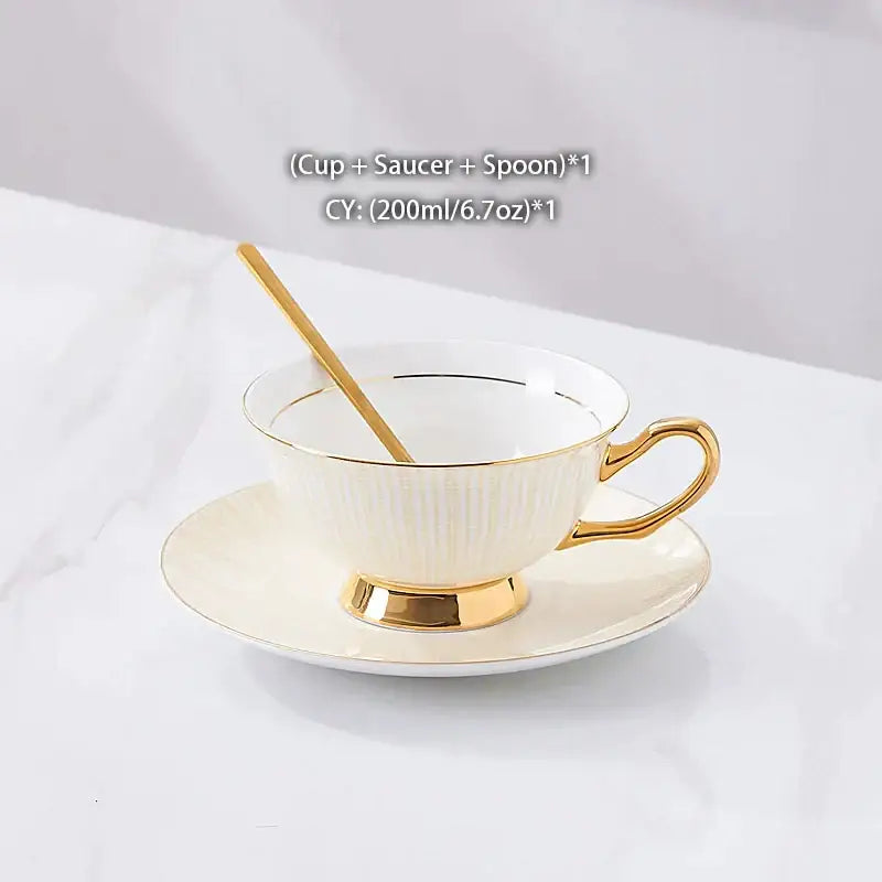 Elegant gold porcelain tea set ivory teacup with gold trim and ribbed texture from decorbites gold porcelain collection