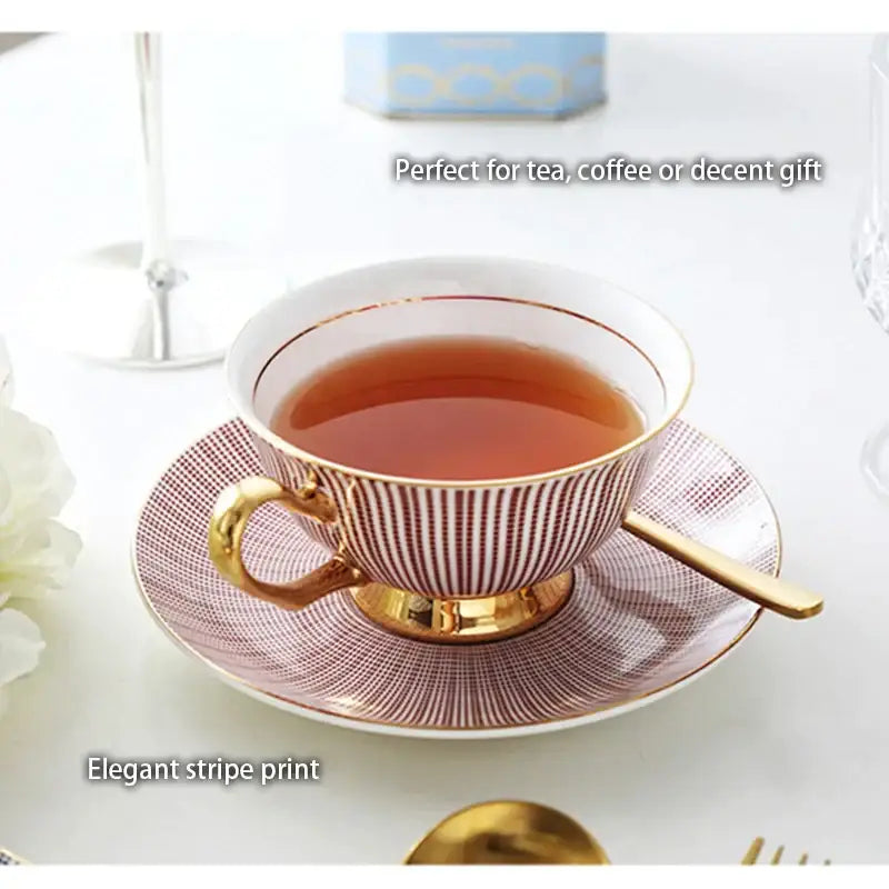 A delicate porcelain teacup with maroon and white stripes and gold trim from decorbites gold porcelain tea set dining room rack
