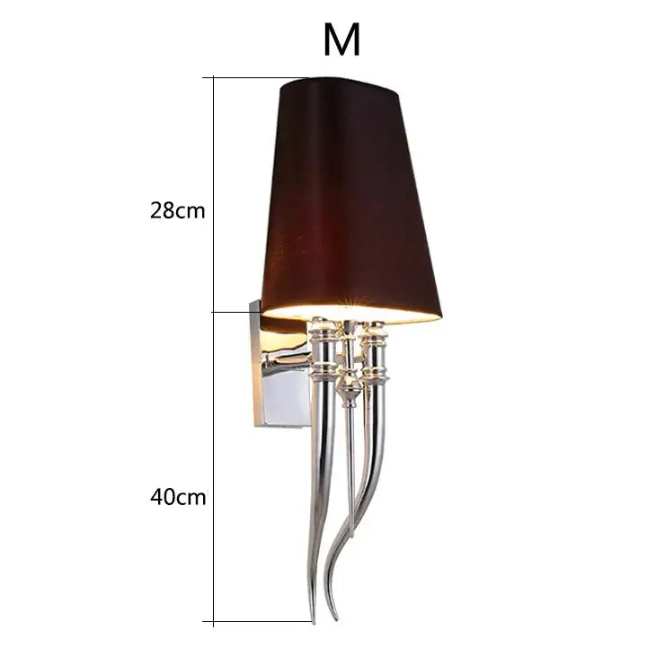 Elegant iron claw horn wall sconce with dark brown fabric shade and polished chrome arms for bedroom use