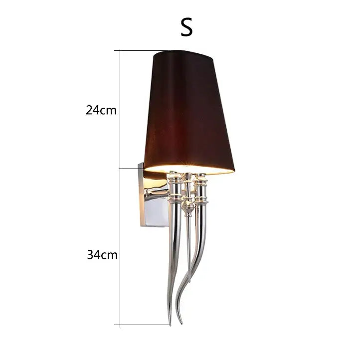 Elegant gold and silver iron claw horn wall sconce with dark brown fabric shade and polished chrome arms for bedroom use