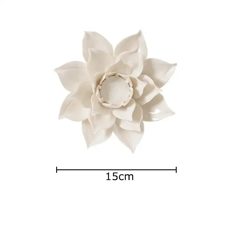 A delicate off-white ceramic lotus flower ornament with layered petals featured in decorbites elegant porcelain wall ornaments