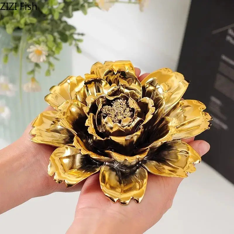 A glossy gold elegant porcelain peony wall ornament with intricate petals and dark center for decorbites living room decor