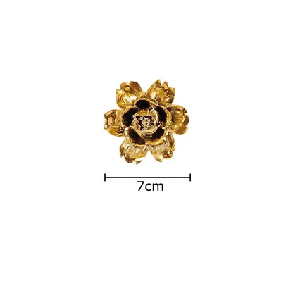 Gold-toned metallic flower-shaped brooch with detailed petals 7cm wide for decorbites elegant porcelain wall ornaments