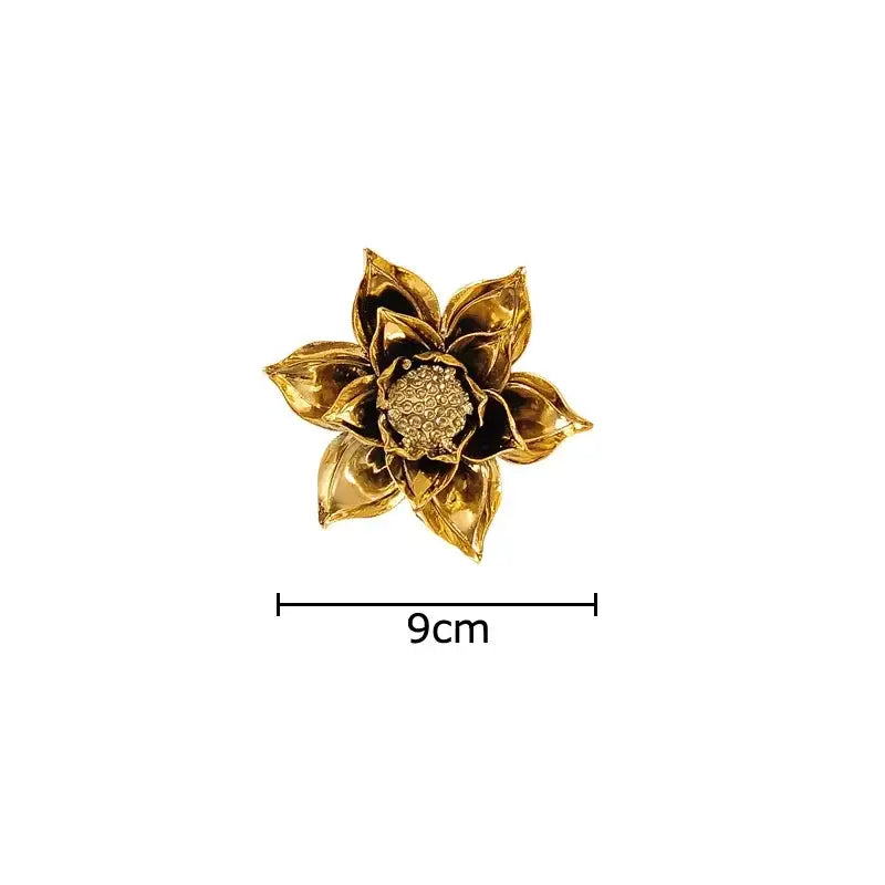 A golden lotus flower brooch with detailed petals and textured center for decorbites elegant porcelain peony wall ornaments