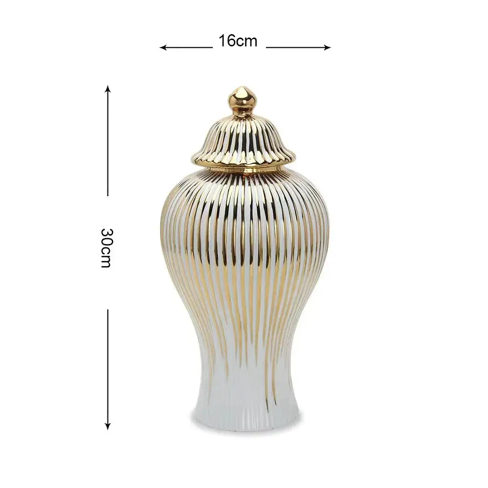 Elegant white ceramic ginger jar with gold striped design and matching gold lid for living room storage decorbites gold striped