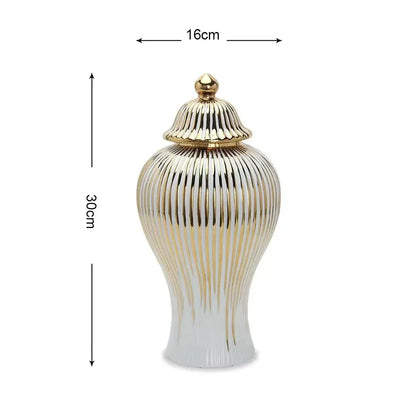 Elegant white ceramic ginger jar with gold striped design and matching gold lid for living room storage decorbites gold striped