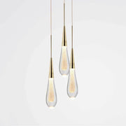 Elegant gold pendant lights with teardrop decorbites crystal glass led shades filled with glowing golden particles for dining room