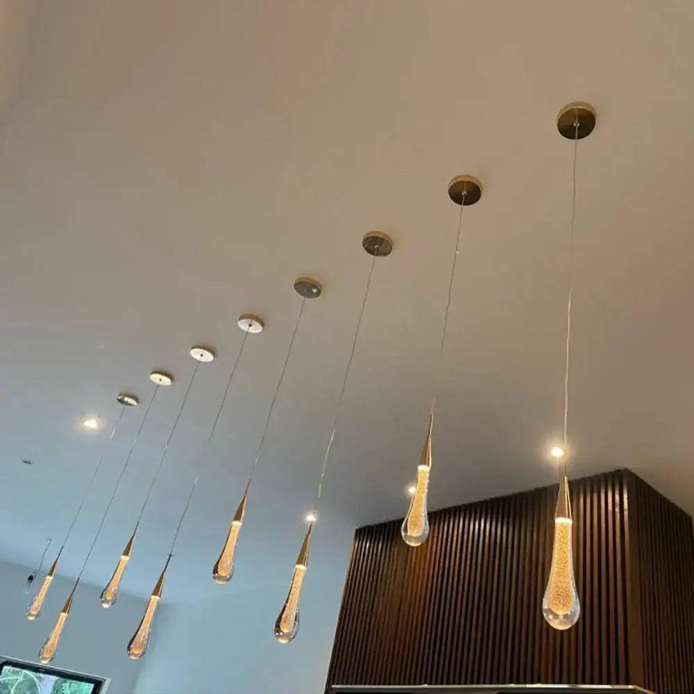Elegant gold teardrop crystal glass pendant light with brass accents and golden LED decorbites crystal glass decor