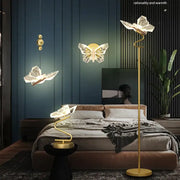 Elegant golden decorbites butterfly chandelier floor lamp with translucent wings and curved metallic stem for bedroom use