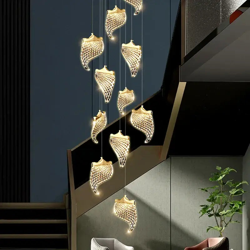 Elegant golden shell acrylic chandelier with intricate crystal detailing and warm glowing lights for living room dining hall