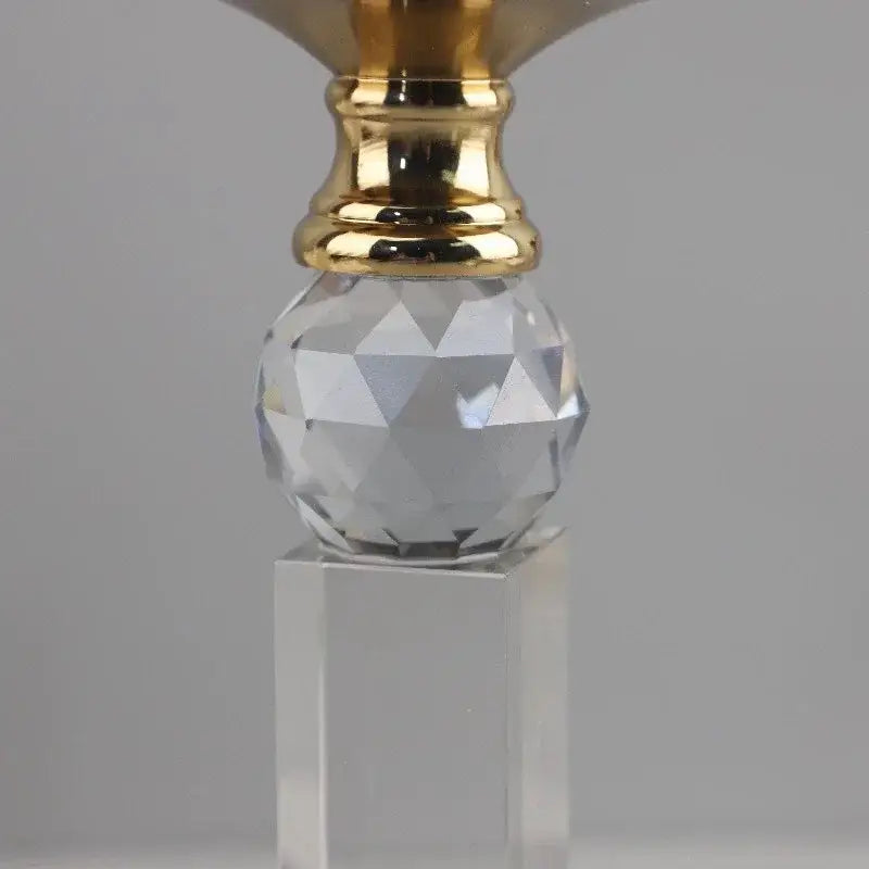 Elegant gray and gold candle holder featuring a decorbites clear crystal geometric faceted ball on acrylic pedestal