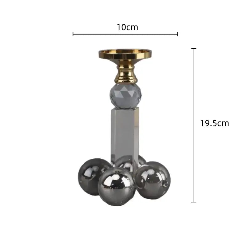 Elegant gray and gold clear crystal geometric candle holder with faceted sphere and acrylic column for dining room decorbites