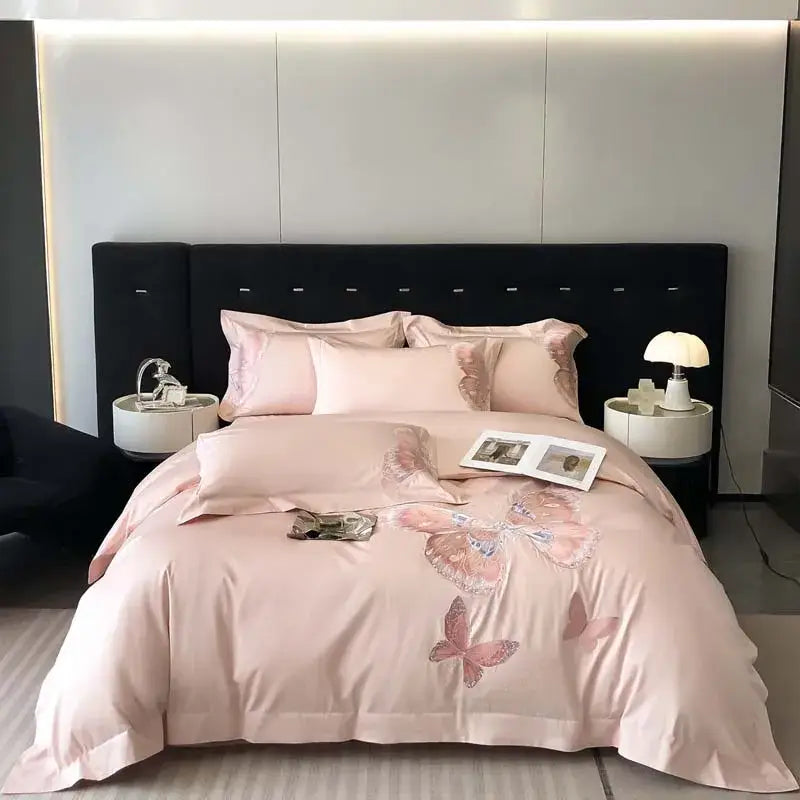 Pink satin bedding set with decorbites butterfly embroidery featuring elegant gray butterfly embroidery bedding design