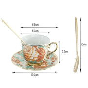 Elegant hand painted flower ceramic coffee cup set with gold-trimmed floral design in peach coral and teal hues