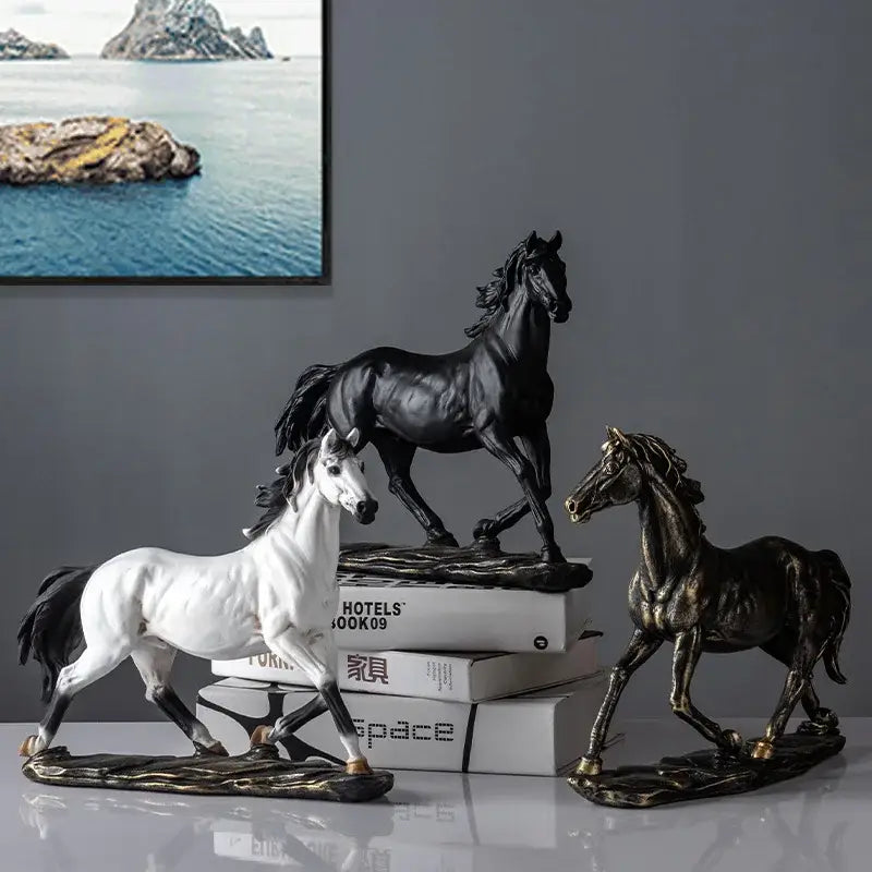 Three elegant horse resin statues in black, white, and bronze tones on textured bases for living room decor
